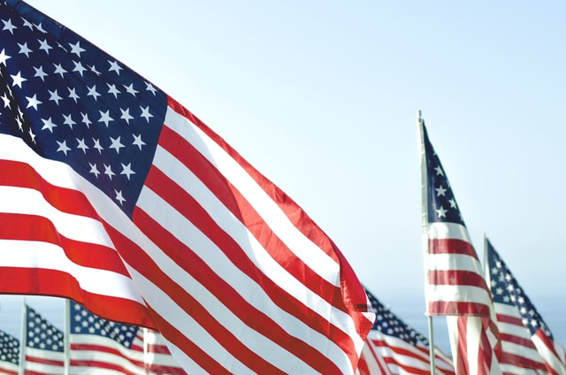 American Flags against a blue sky